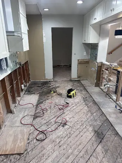 Kitchen flooring removed so the subfloor can dry after a leak in Lutz, FL